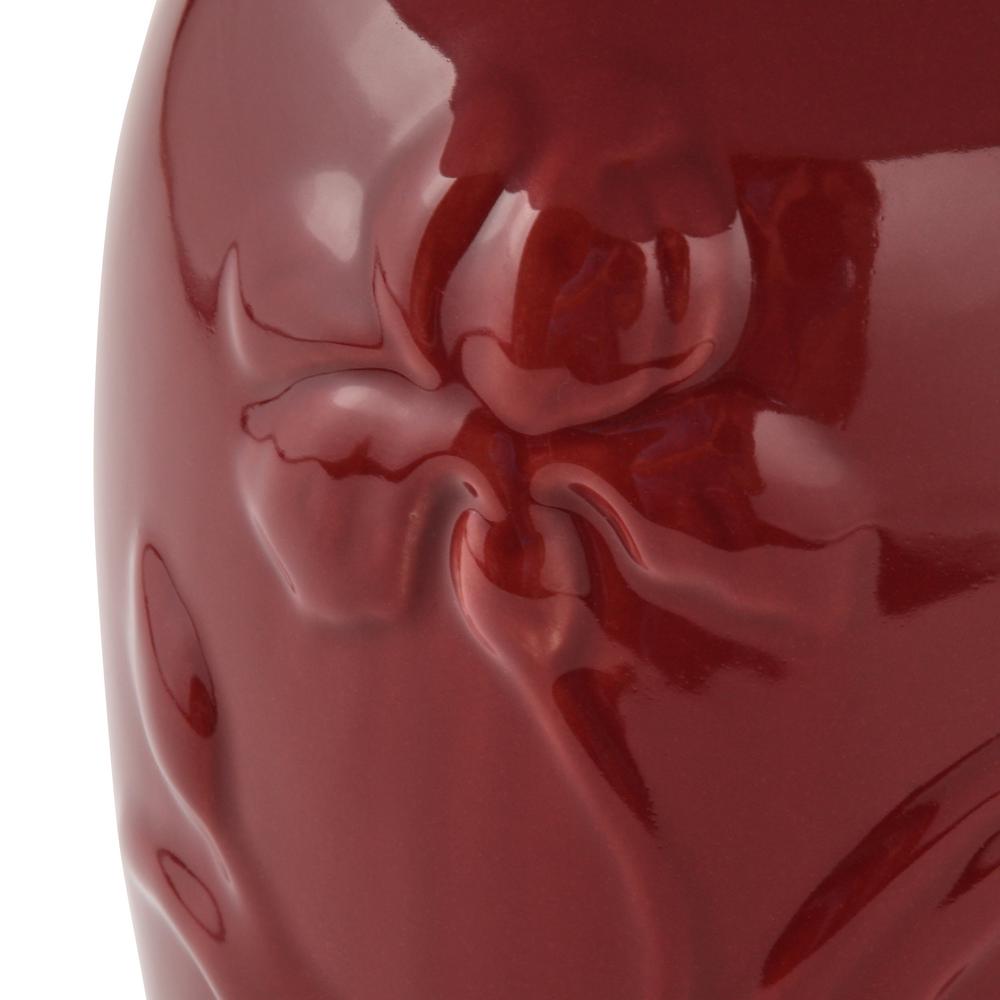 Table lamp featuring a gleaming red finish Table lamp featuring a gleaming red finish