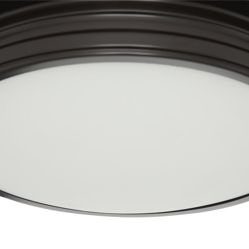 Flush mount light featuring an etched white glass diffuser Flush mount light featuring an etched white glass diffuser
