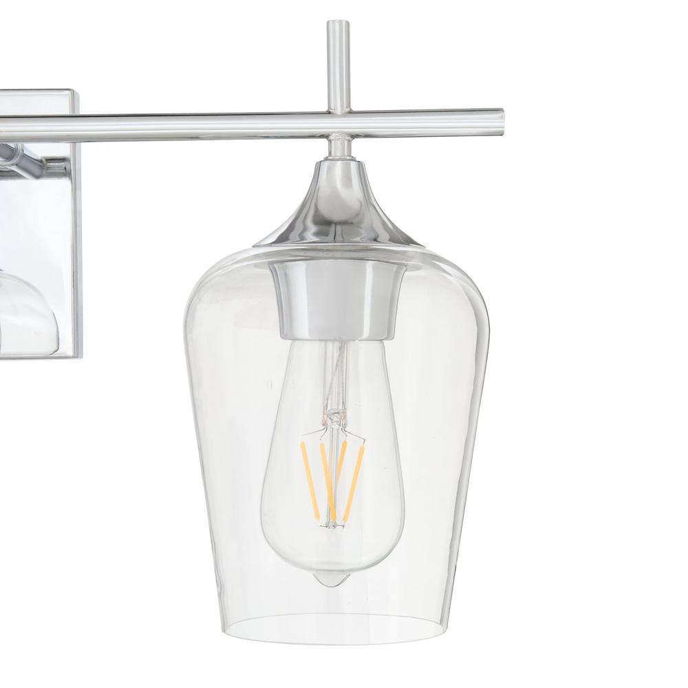 Vanity light featuring clear glass shades