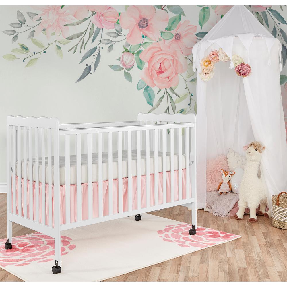 https://images.homedepot-static.com/productImages/066309f3-601d-46b4-a9b2-4049c0079817/svn/white-dream-on-me-cribs-mattresses-675-w-64_1000.jpg