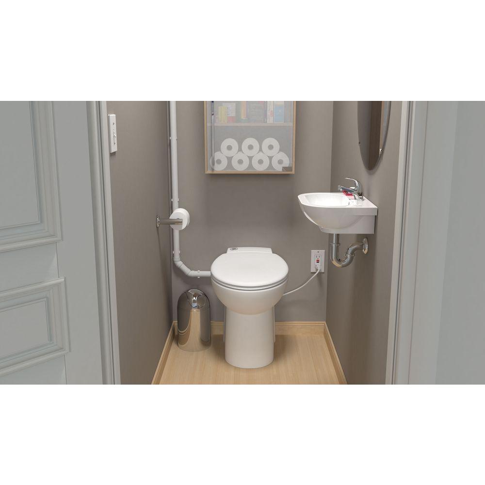 Saniflo Sanicompact 1 Piece 1 28 1 Gpf Dual Flush Elongated Toilet In White With Built In 0 3 Hp 115 Volt Macerator Pump