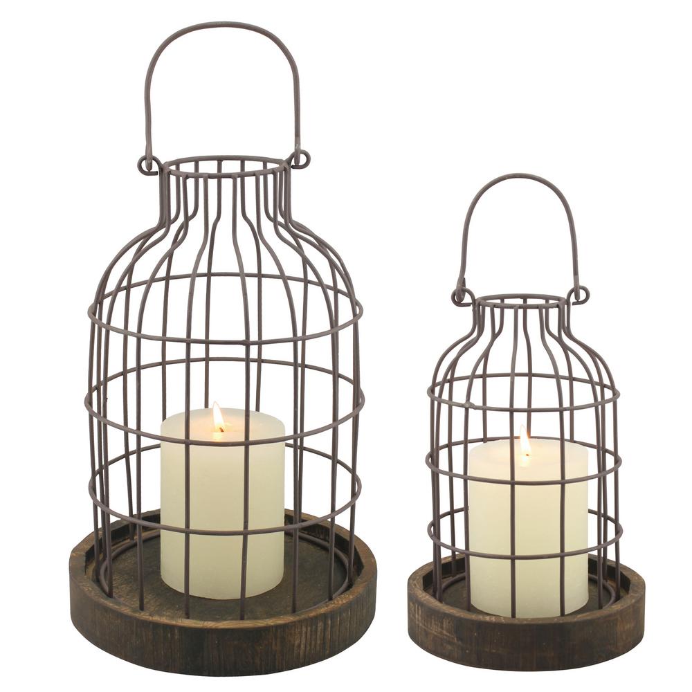 Stonebriar Collection 11 5 In Brown Weathered Metal Lantern With Brown Weathered Metal Lantern With Wood Base Set Of 2
