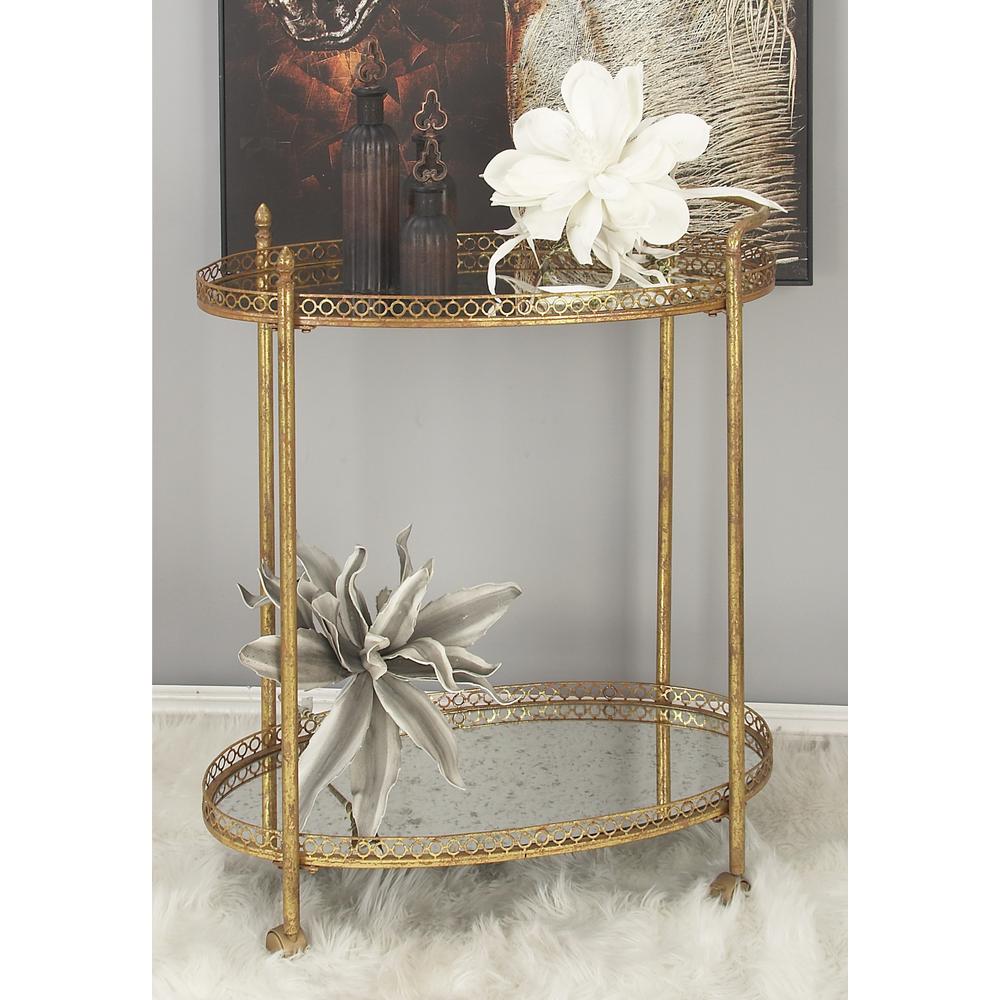 Litton Lane 2 Tiered Iron And Glass Oval Wheeled Bar Cart In Glass Oval Wheeled Bar Cart