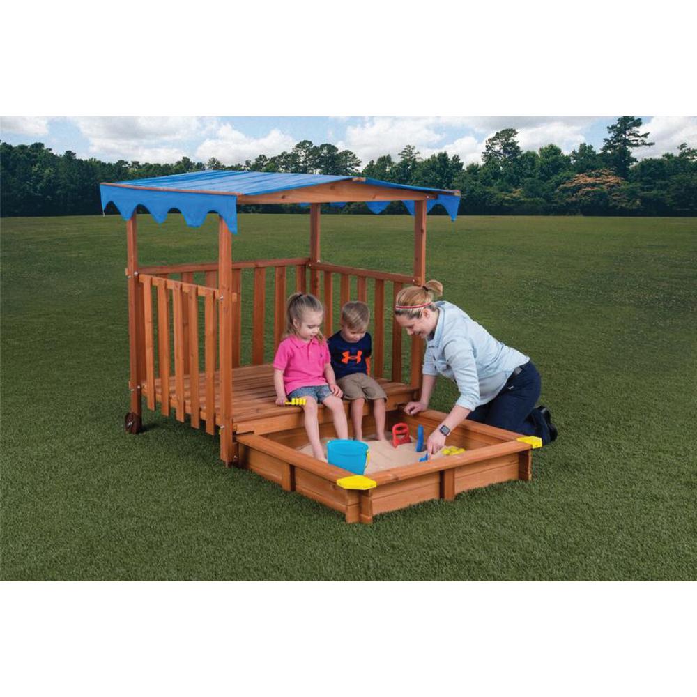 outdoor playhouse with sandbox