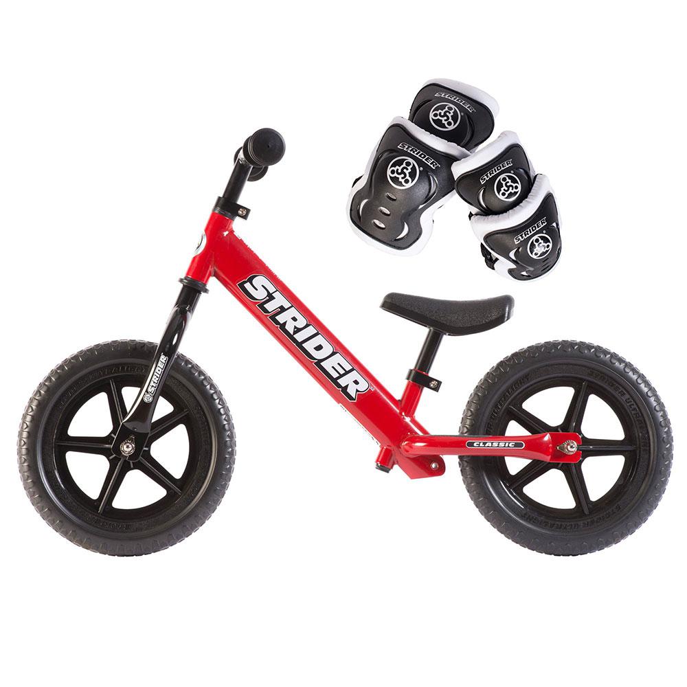 kid riding strider bike