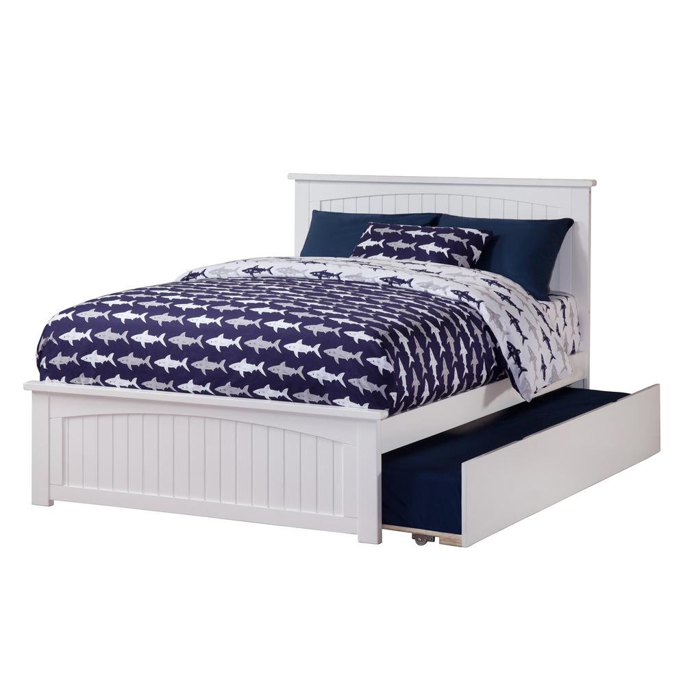 white wood twin bed with trundle