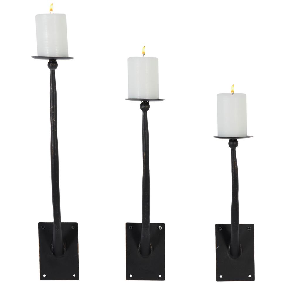 Litton Lane 16 In 19 In 22 In Tall Modern Black Metal Wall Sconce Pillar Candle Holders Set Of 3 16413 The Home Depot