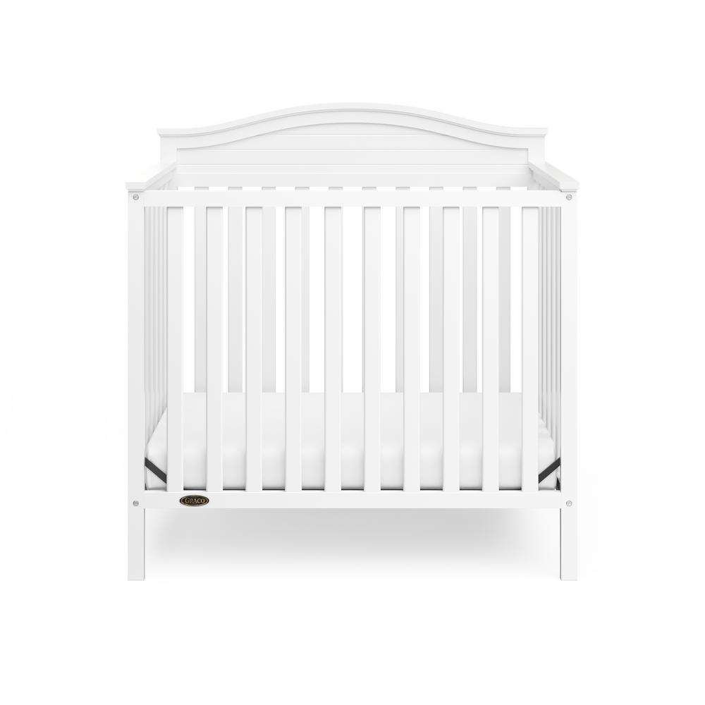 mini mattress crib