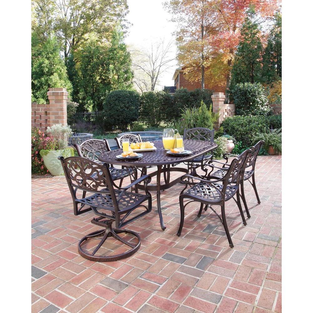 Home Styles Biscayne Bronze 7 Piece Patio Dining Set 4 Stationary 2 Home Styles Biscayne Bronze 7 Piece Patio Dining Set 4 Stationary 2 Motion