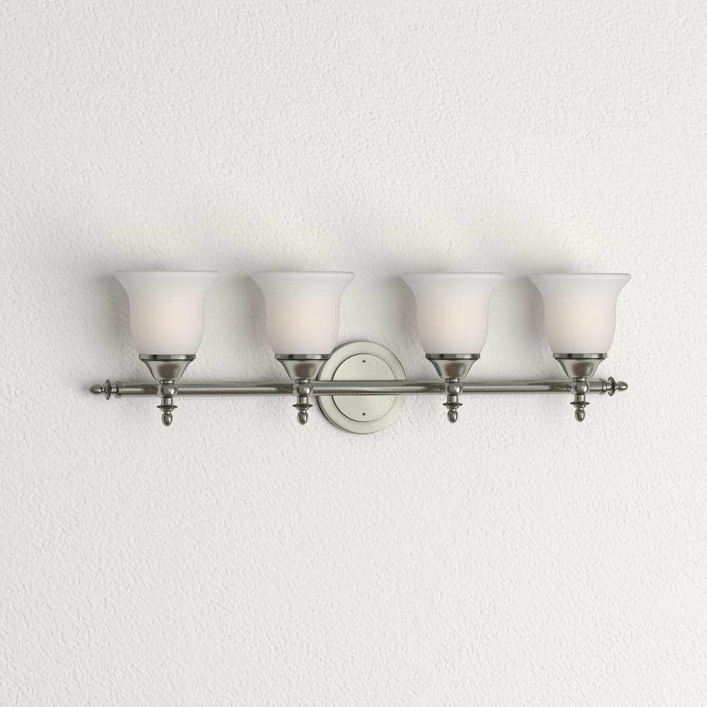 Hampton Bay Olgelthorpe 4 Light Brushed Nickel Bathroom Vanity Light With Bell Shaped Frosted Glass Shades Nb49302 The Home Depot