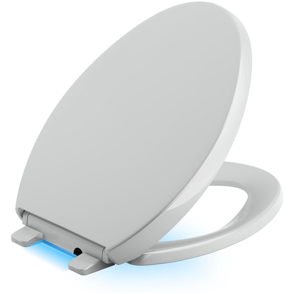 KOHLER Reveal LED Nightlight Elongated Closed Front Toilet Seat in Ice