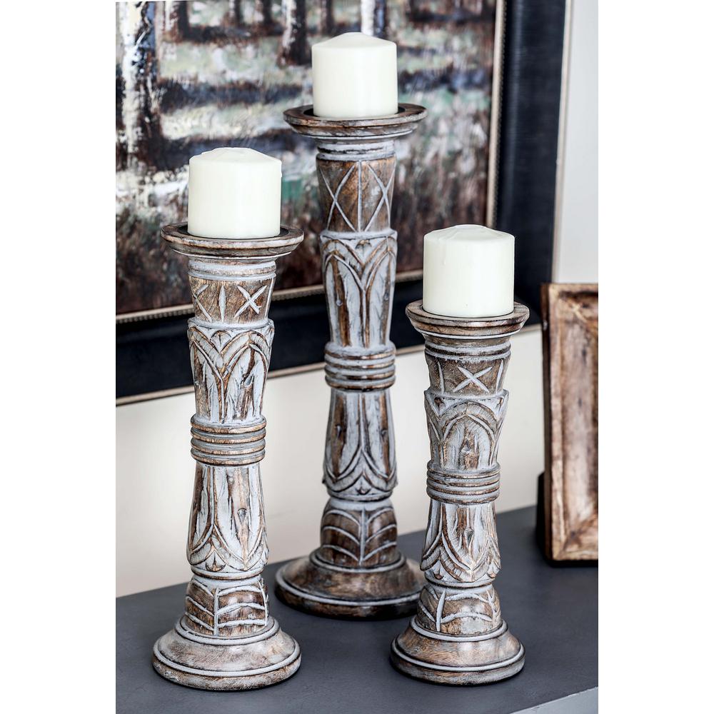 Litton Lane Rustic Brown Carved Mango Wood Candle Holder Set Of 3 Litton Lane Rustic Brown Carved Mango Wood Candle Holder Set Of 3
