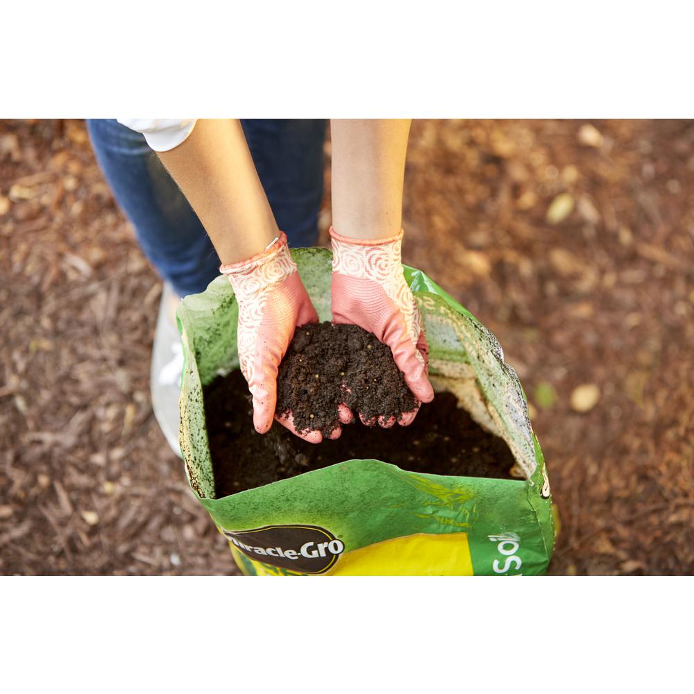 Miracle Gro Garden Soil All Purpose For In Ground Use 0 75 Cu Ft The Home Depot