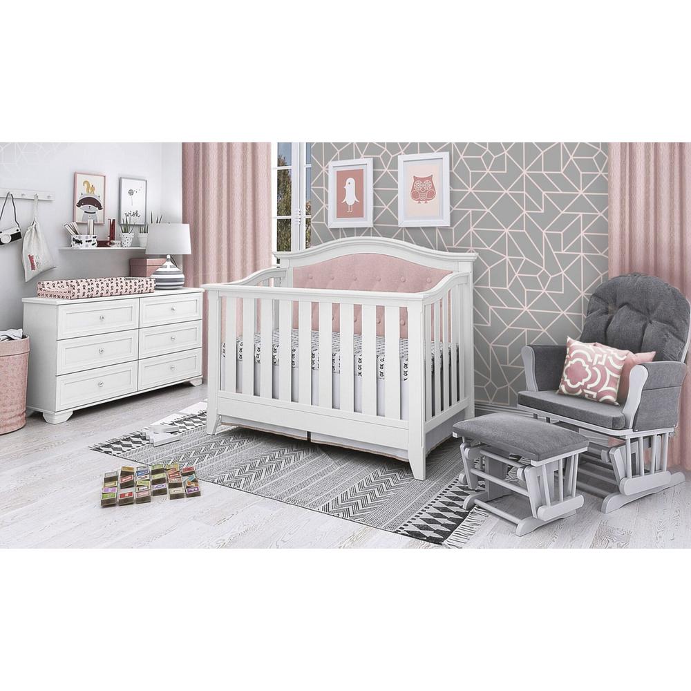 pink tufted crib