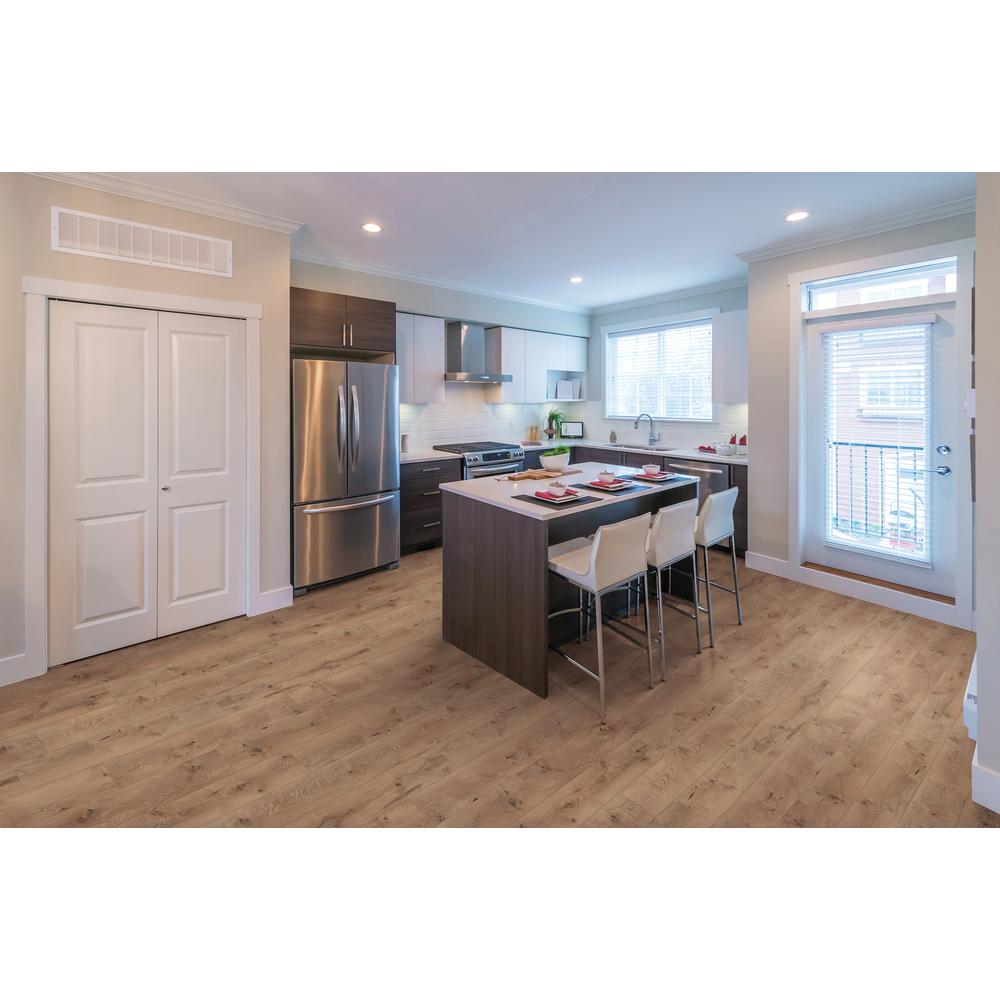 Trafficmaster Cameron Oak 7 Mm Thick X 2 3 In Wide 50 5 8 Length Laminate Flooring 24 17 Sq Ft Case 45106 The Home Depot Trafficmaster Cameron Oak 7 Mm Thick X
