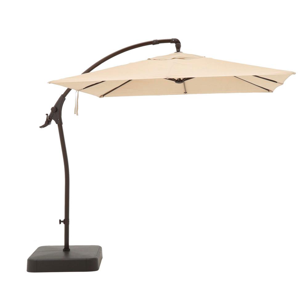 Beige Hampton Bay Manual Tilt Patio Umbrellas Patio Furniture The Home Depot