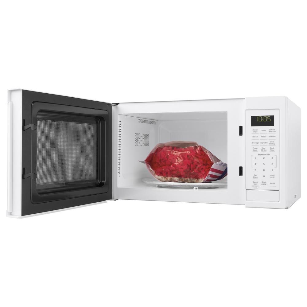 Ge 0 9 Cu Ft Countertop Microwave In White Jes1095dmww The Ge 0 9 Cu Ft Countertop Microwave In