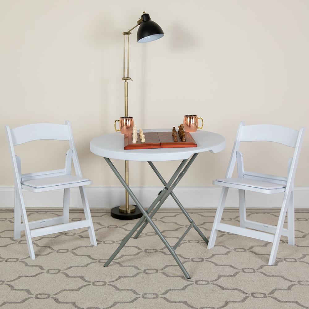 https://images.homedepot-static.com/productImages/49a04981-82b6-44a5-915a-95699c4e84d9/svn/white-vinyl-flash-furniture-folding-chairs-lel1white-64_1000.jpg