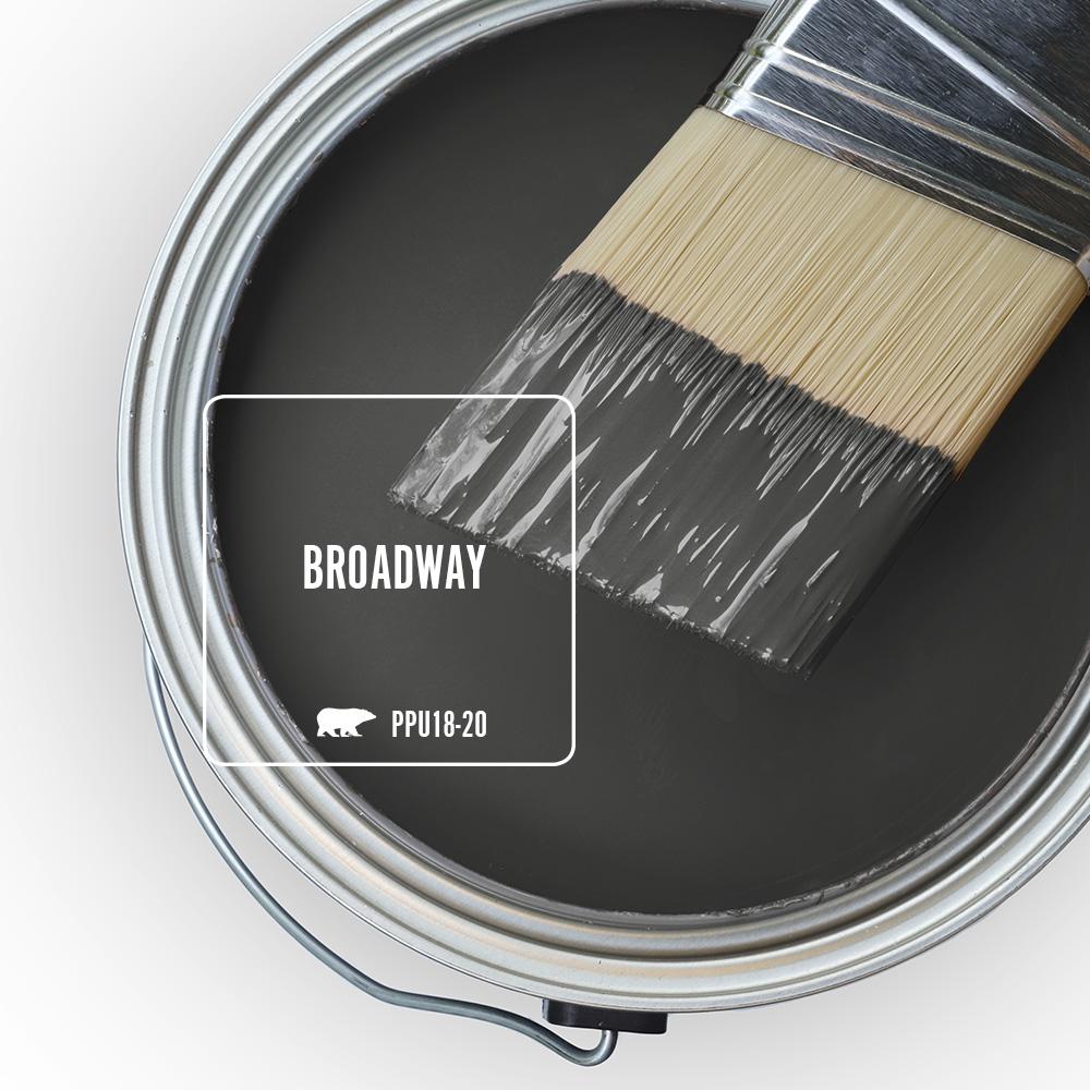 Behr Broadway is a brown-black, urban sort of deep bronze paint color. Discover inspiring understated neutrals to try in your own home. #behrbroadway #paintcolors