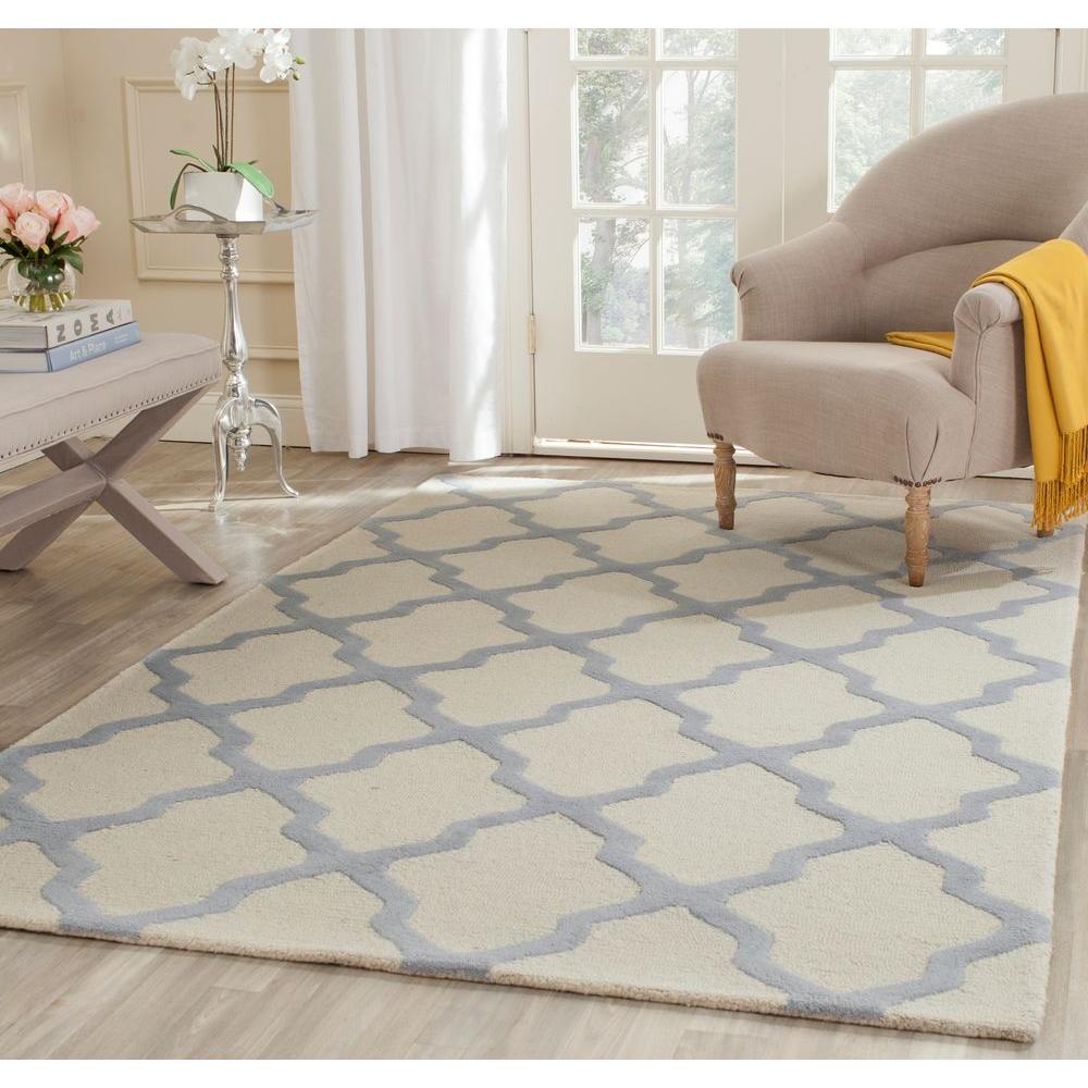 light blue rug with cherries