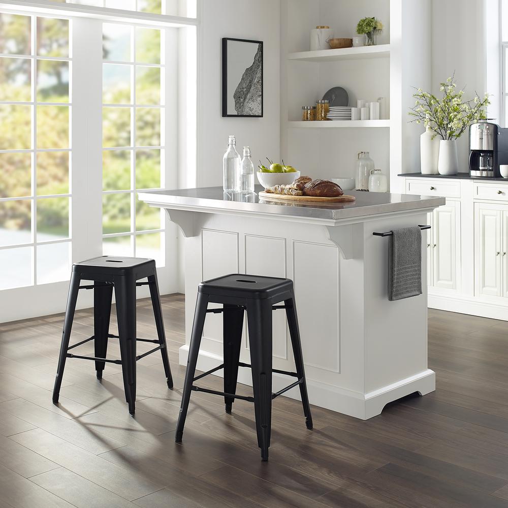 white kitchen island with bar stools