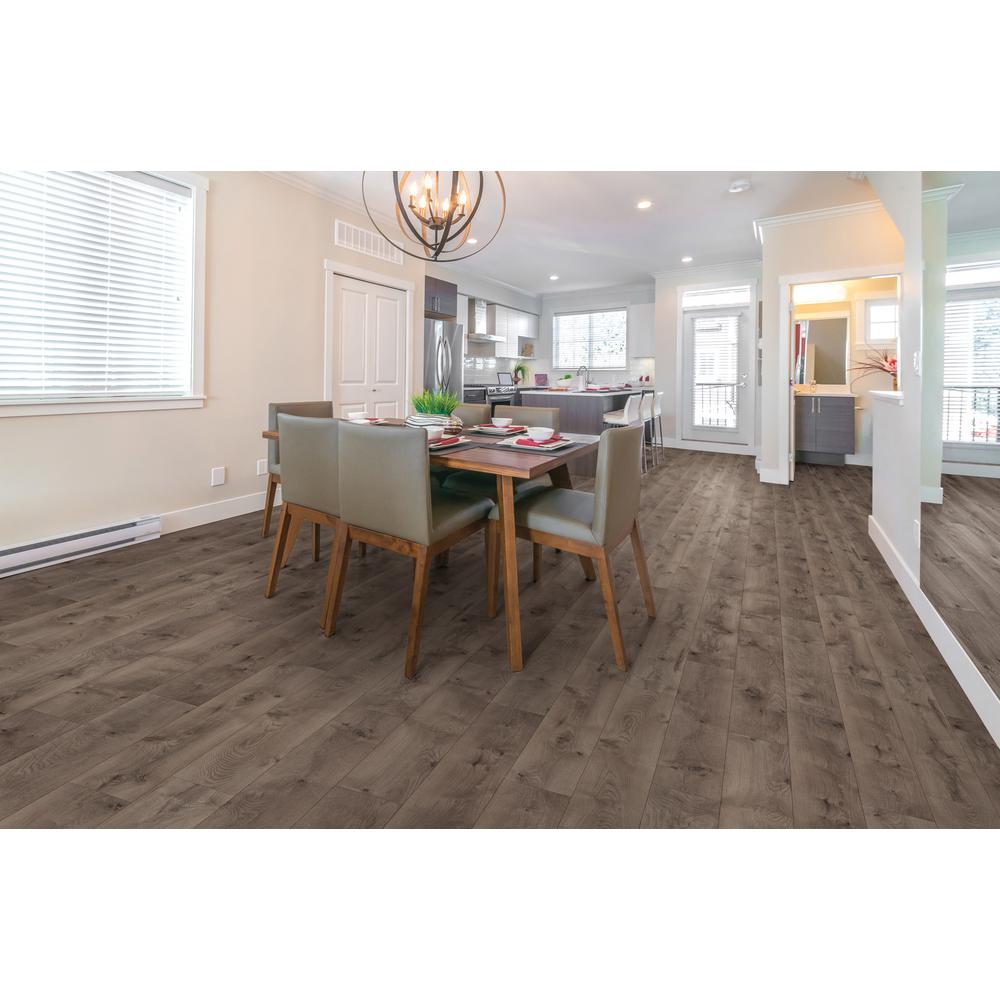 Trafficmaster Anniston Oak 7 Mm Thick X 7 2 3 In Wide X 50 5 8 In Length Laminate Flooring 1063 48 Sq Ft Pallet 45108p The Home Depot
