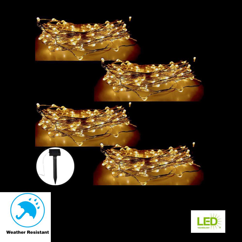 Solar String Lights Outdoor Lighting The Home Depot 100 Light 20 Ft Integrated Led Solar Copper String 4 Pack