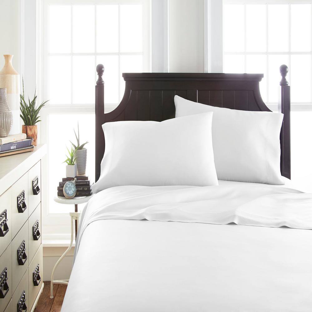 white bed sheets and pillowcases