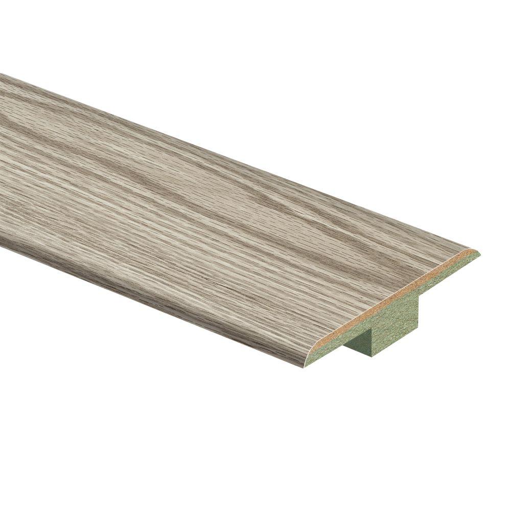 Laminate Moulding Trim Flooring The Home Depot Greyhawk Oak 7 16 In Thick X 1 3 4