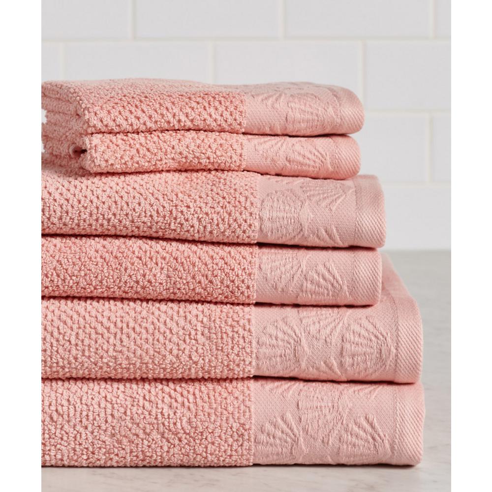 coral and white bath towels