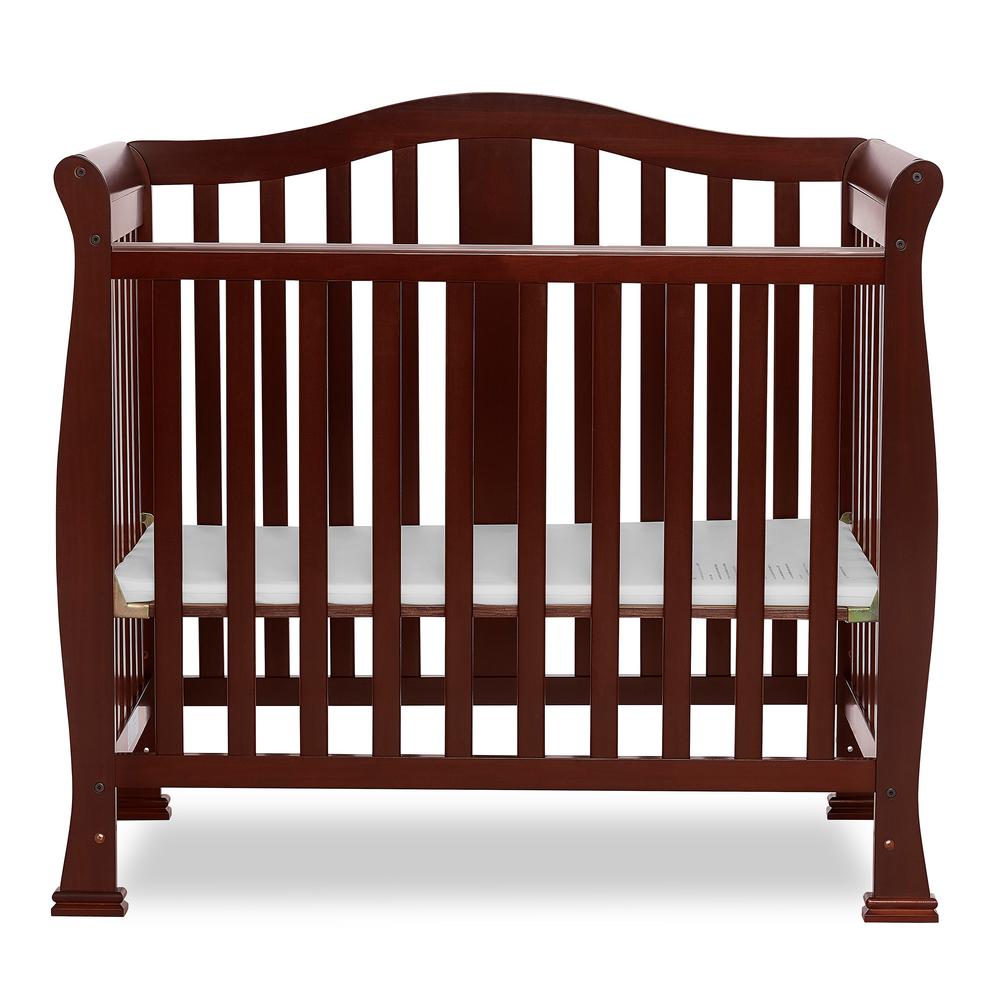 brown mini crib