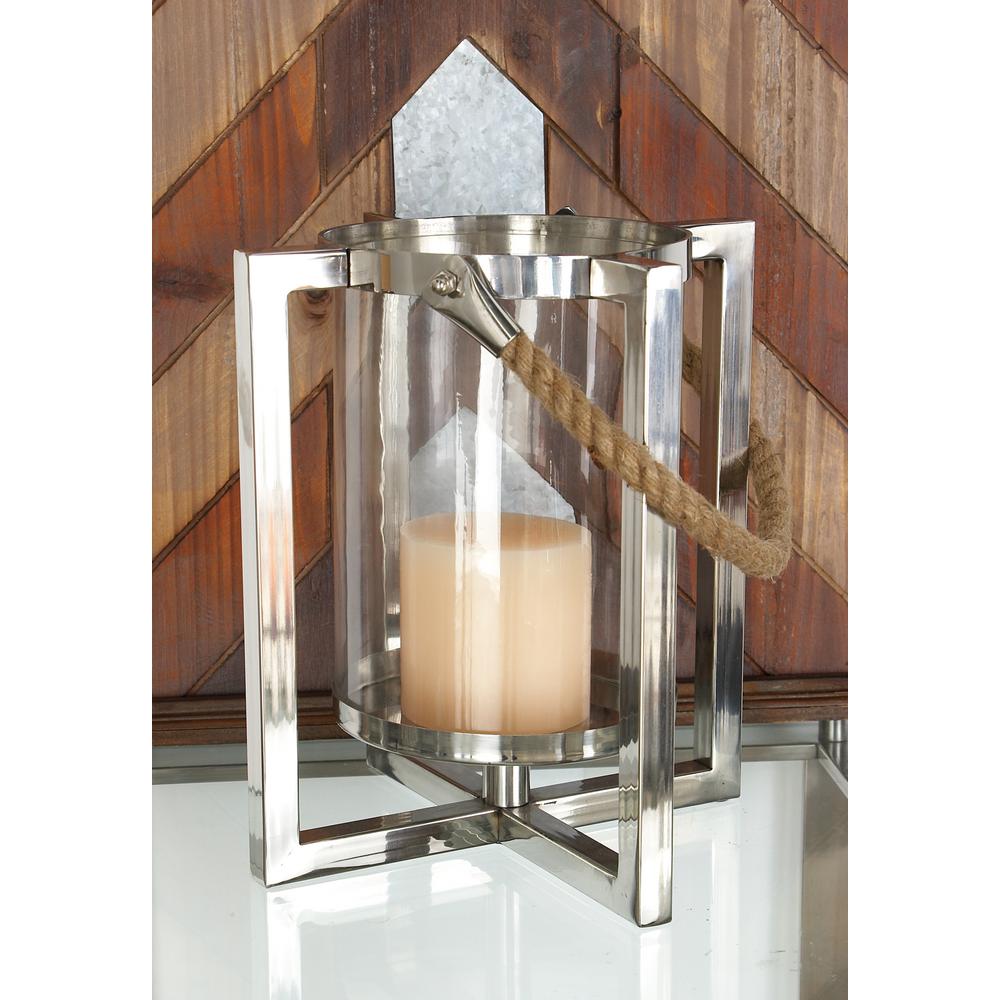 Litton Lane 22 In Silver Stainless Steel And Glass Hurricane Silver Stainless Steel And Glass Hurricane Lantern Candle Holder 23934 The Home Depot