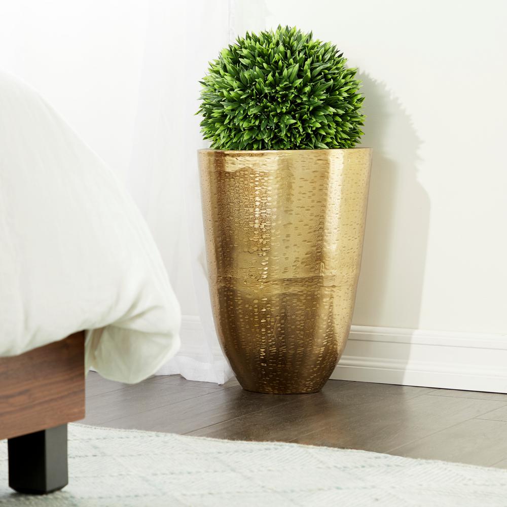 large gold metal vase