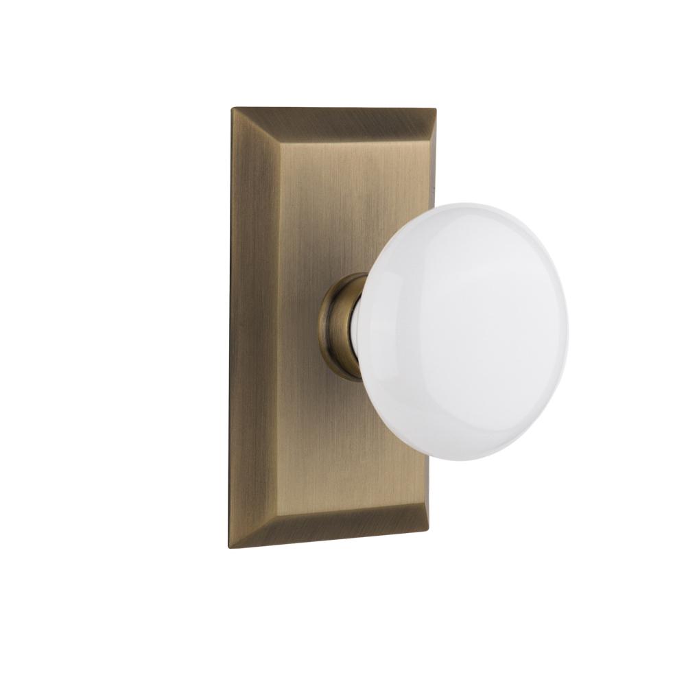 Nostalgic Warehouse Studio Plate 23/4 in. Backset Antique Brass Privacy White Porcelain Door