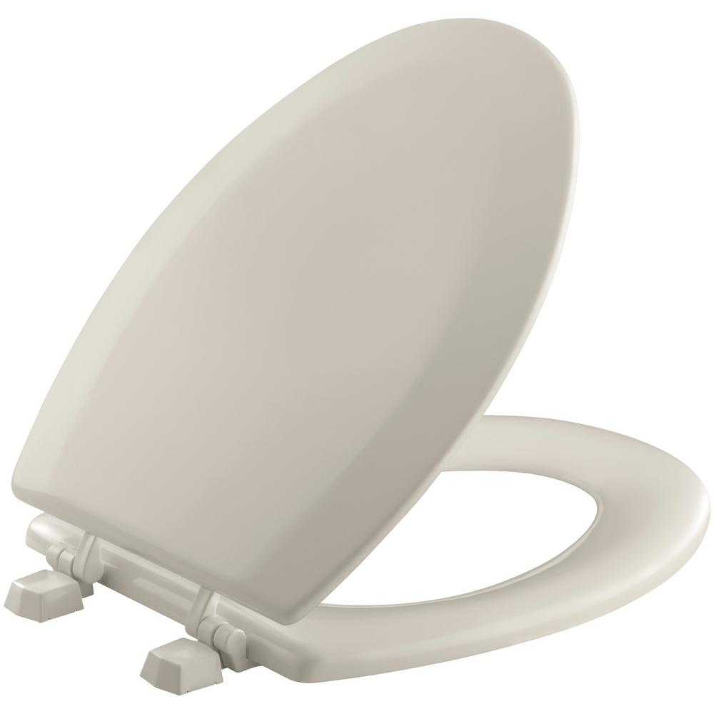 KOHLER Triko Elongated Closed Front Toilet Seat in SandbarK4712TG9 The Home Depot