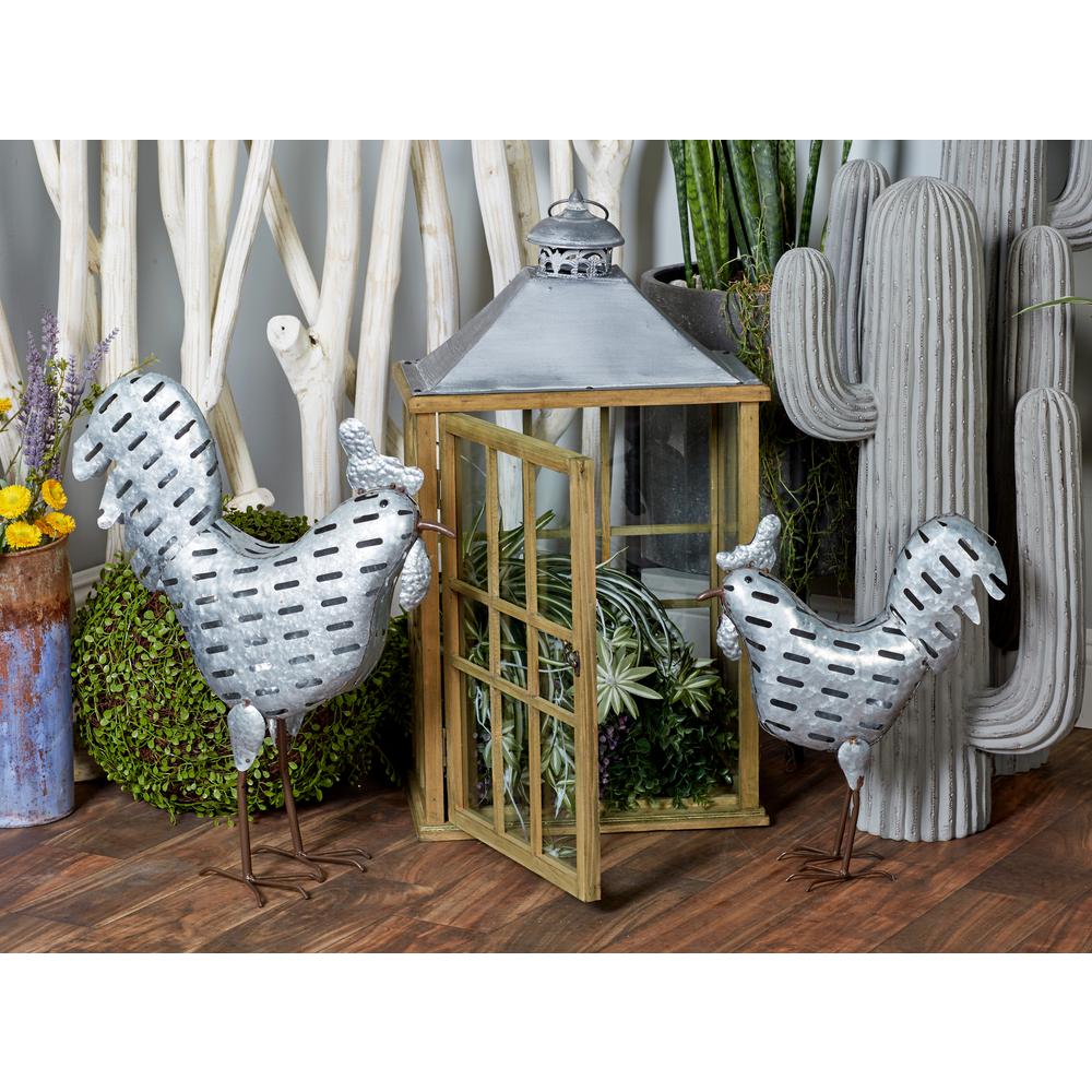 https://images.homedepot-static.com/productImages/7b609bdc-6781-4c4d-981b-80bb2a3cd6d8/svn/litton-lane-sculptures-30063-64_1000.jpg