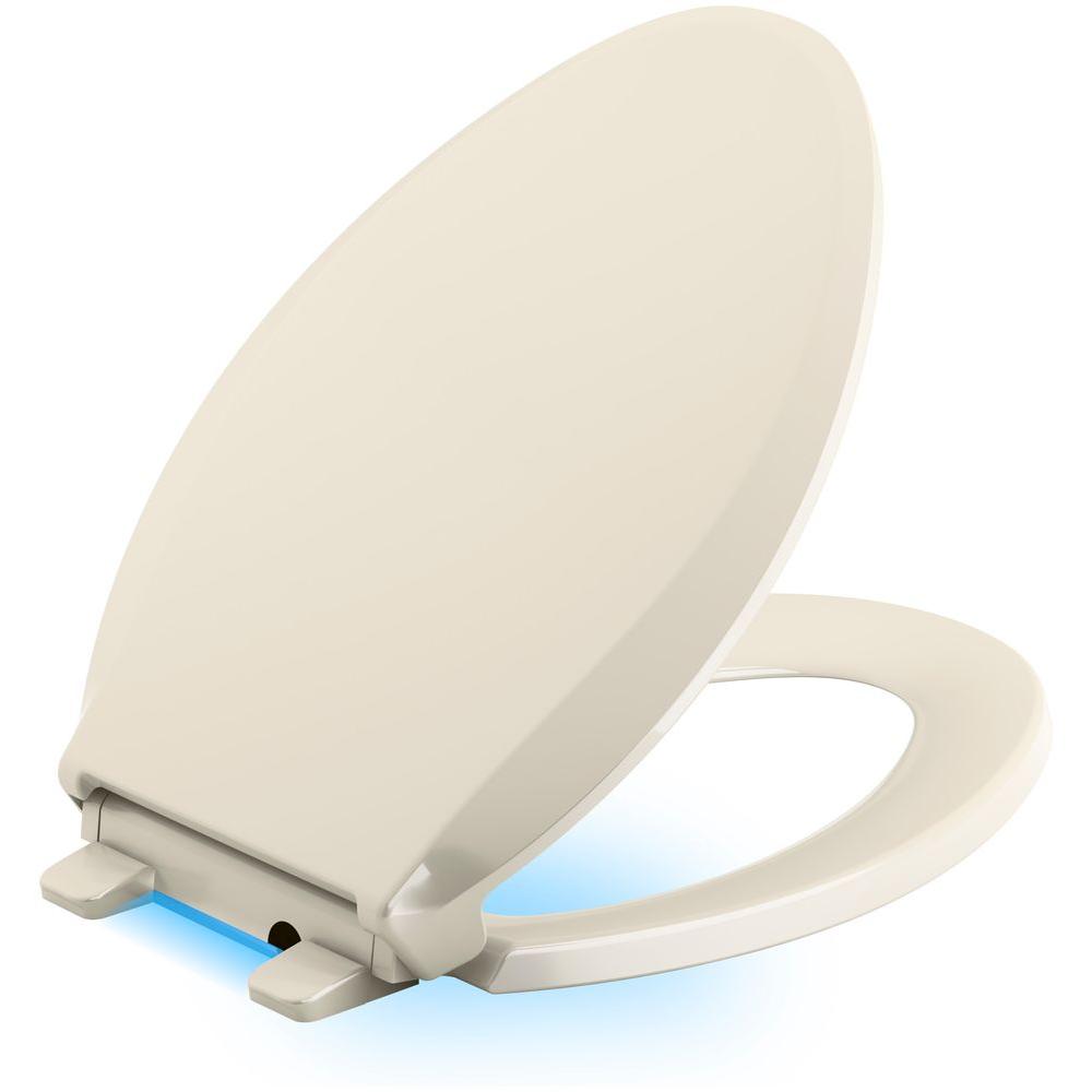 KOHLER Transitions Nightlight Elongated Closed Front Toilet Seat in AlmondK259947 The Home