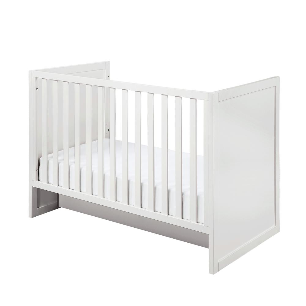 white crib with storage drawer