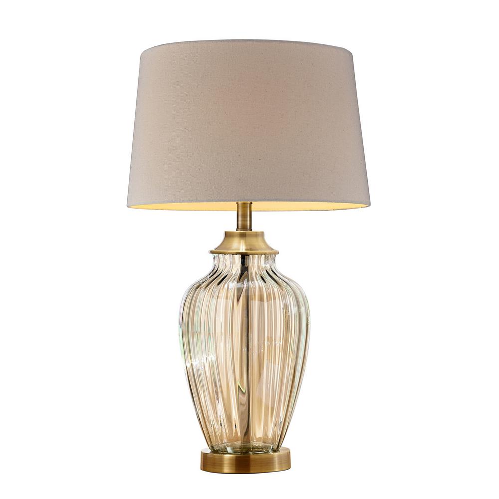 glass and gold table lamp