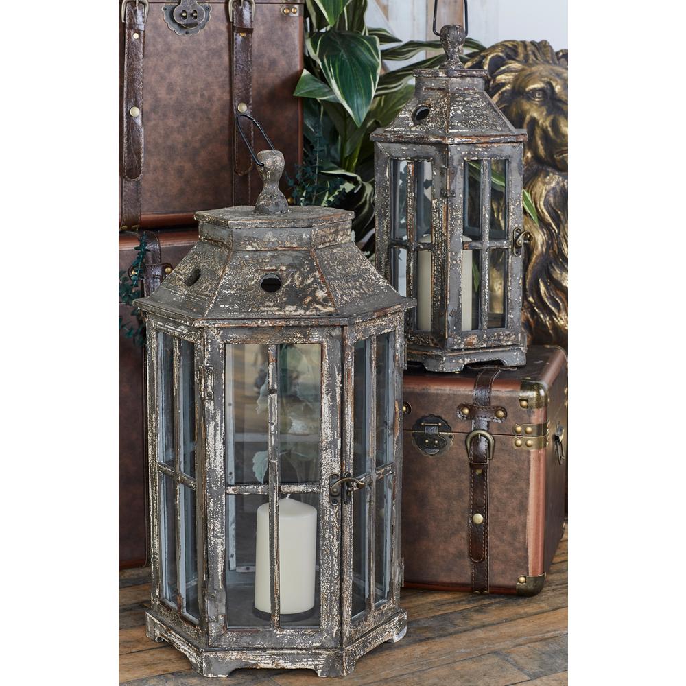 Outdoor Lanterns Torches The Home Depot Brown Hexagonal Windowpane Candle Lanterns Set Of 2