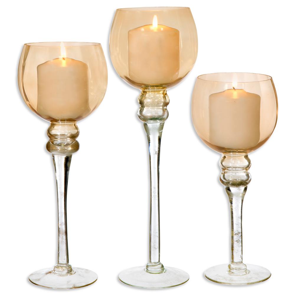 HOME ESSENTIALS & BEYOND Amber Colored Footed Hurricanes (Set of 3