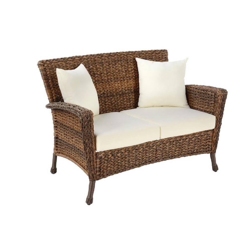 W Unlimited Rustic Wicker Outdoor Loveseat With Beige Cushions