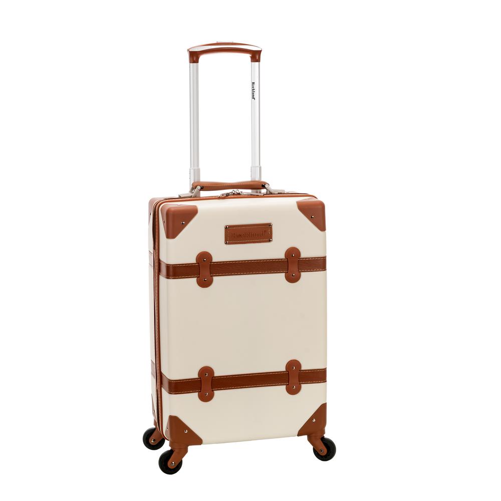 white and tan suitcase