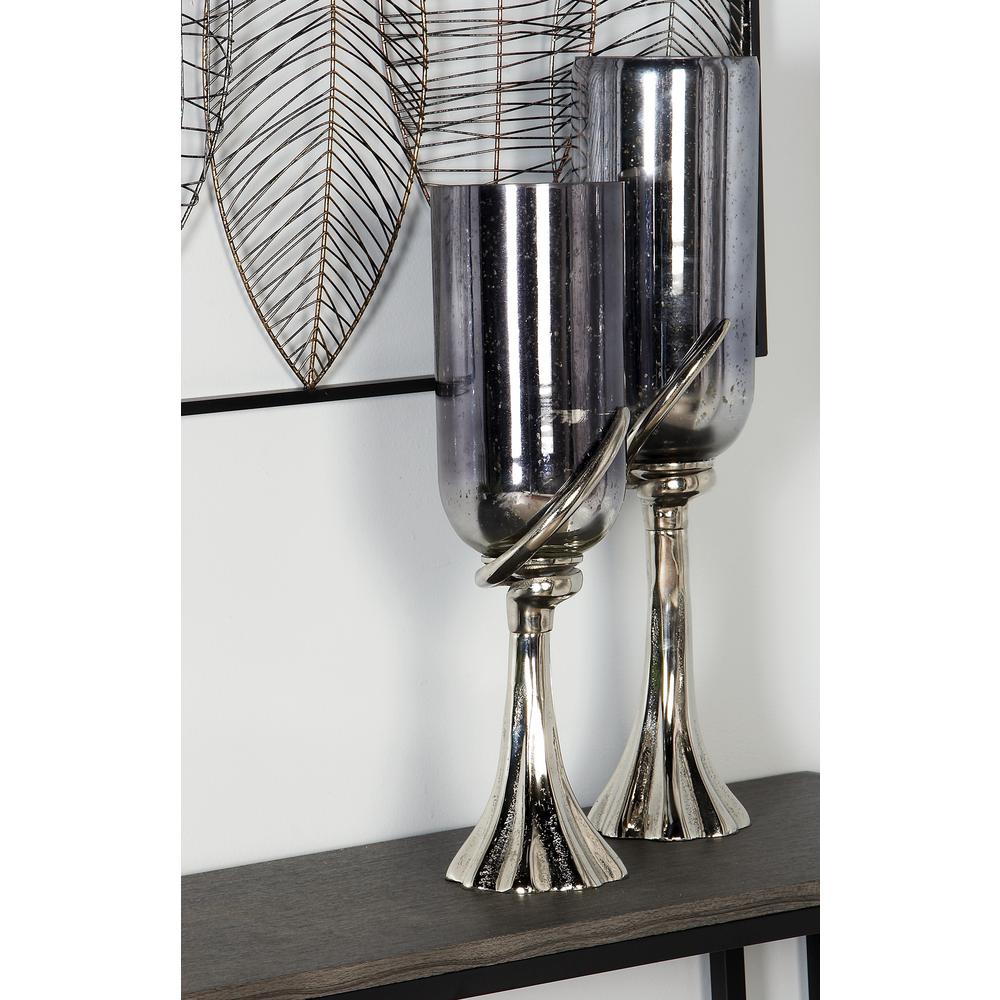 Litton Lane 20 in. Black Glass Chalice Candle Holder with Silver