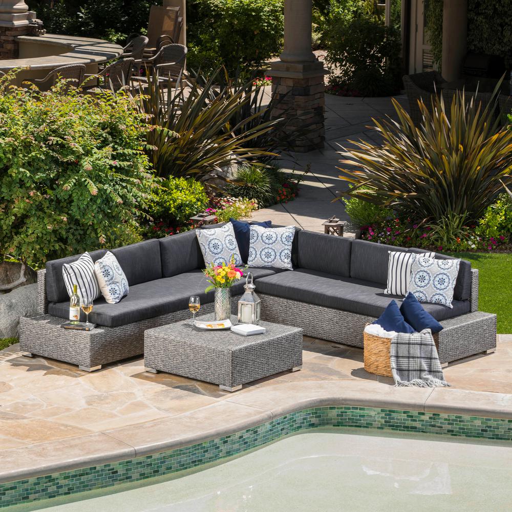 puerta mixed black 4-piece wicker outdoor sectional with dark grey cushions