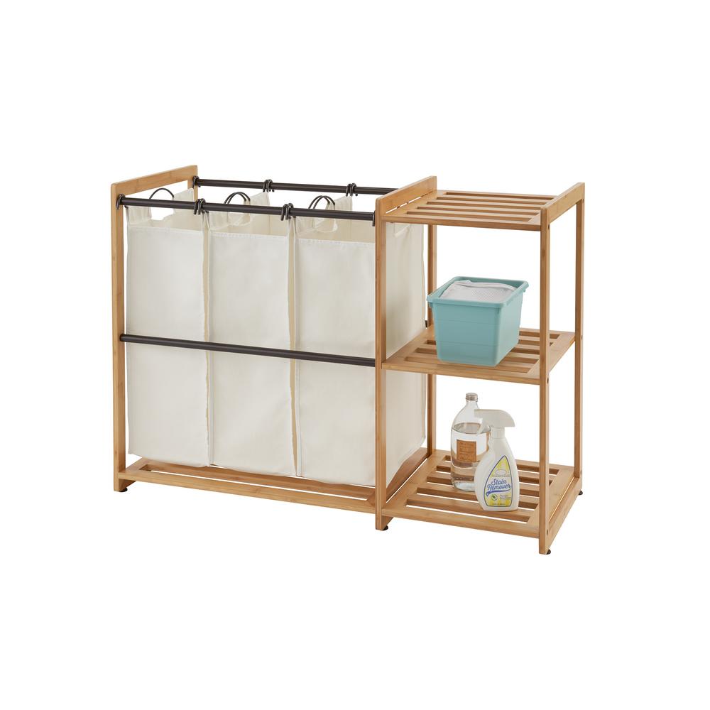 https://images.homedepot-static.com/productImages/983a9c7f-b0d8-427e-8542-115d46c09ce0/svn/bamboo-with-bronze-poles-trinity-laundry-sorters-tbfpbr-2100-64_1000.jpg