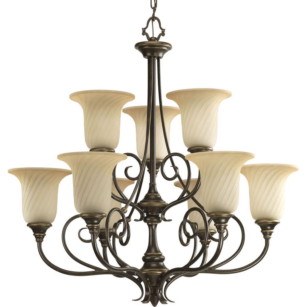 Progress Lighting Kensington Collection 9 Light Forged Bronze Progress Lighting Kensington Collection 9 Light Forged Bronze Chandelier With Frosted Caramel Swirl Glass Shade