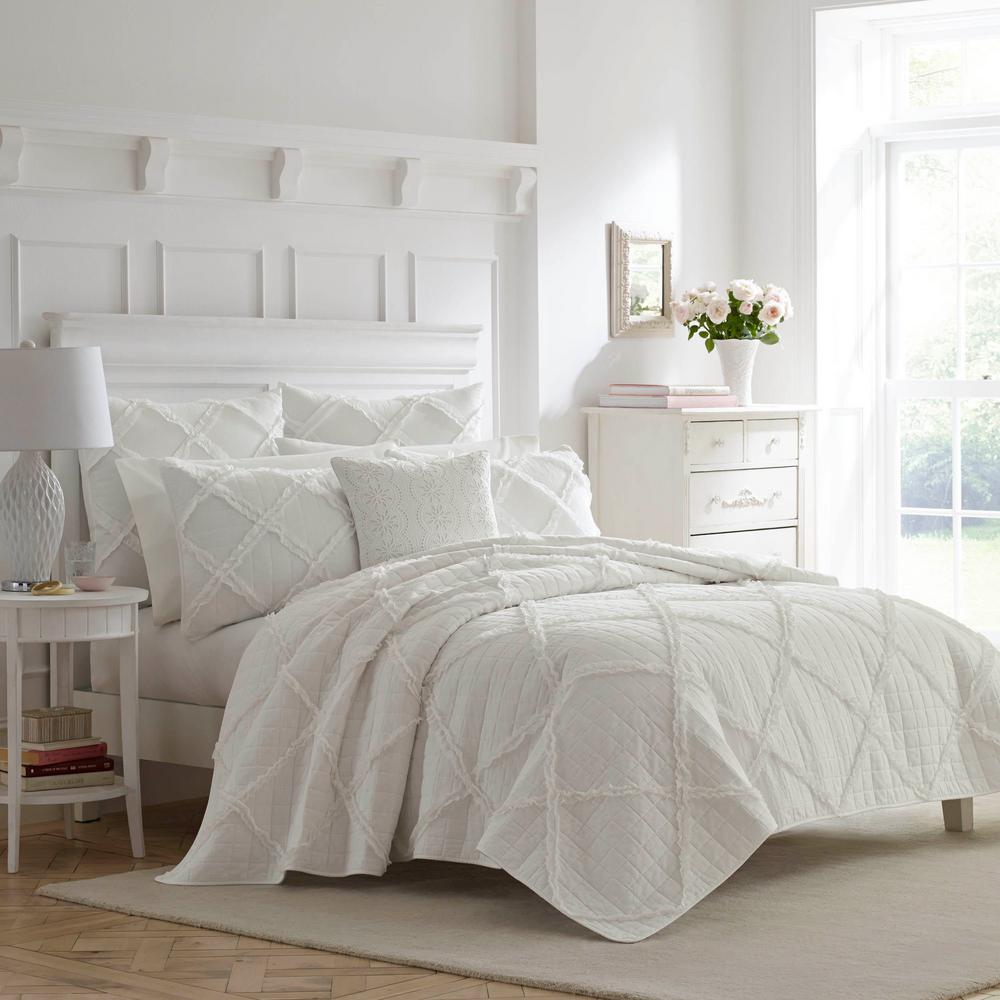 white cotton quilted coverlet