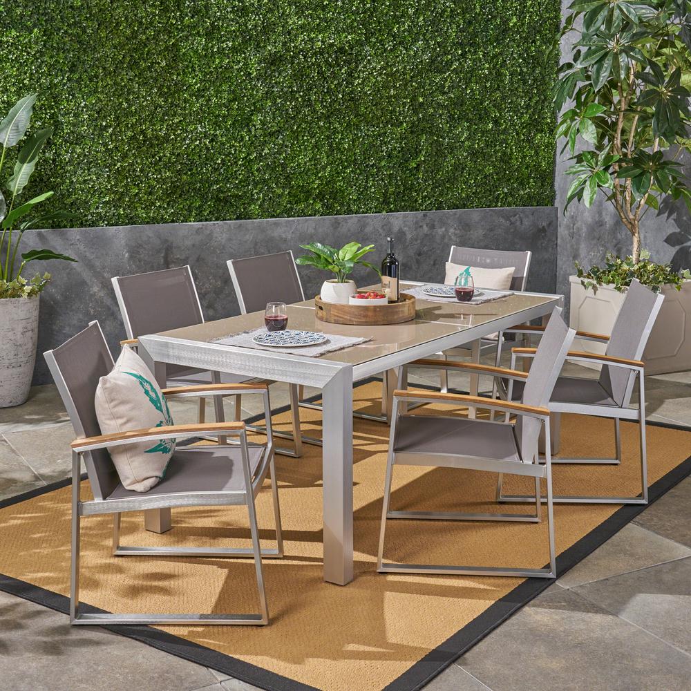 Noble House Rowan Silver And Grey 7 Piece Aluminum Outdoor Dining Set With Glass Table Top 53234 The Home Depot