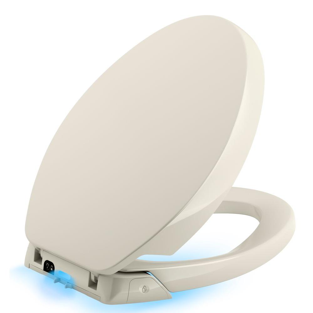 KOHLER Purefresh Round Closed Front Toilet Seat in BiscuitK558996
